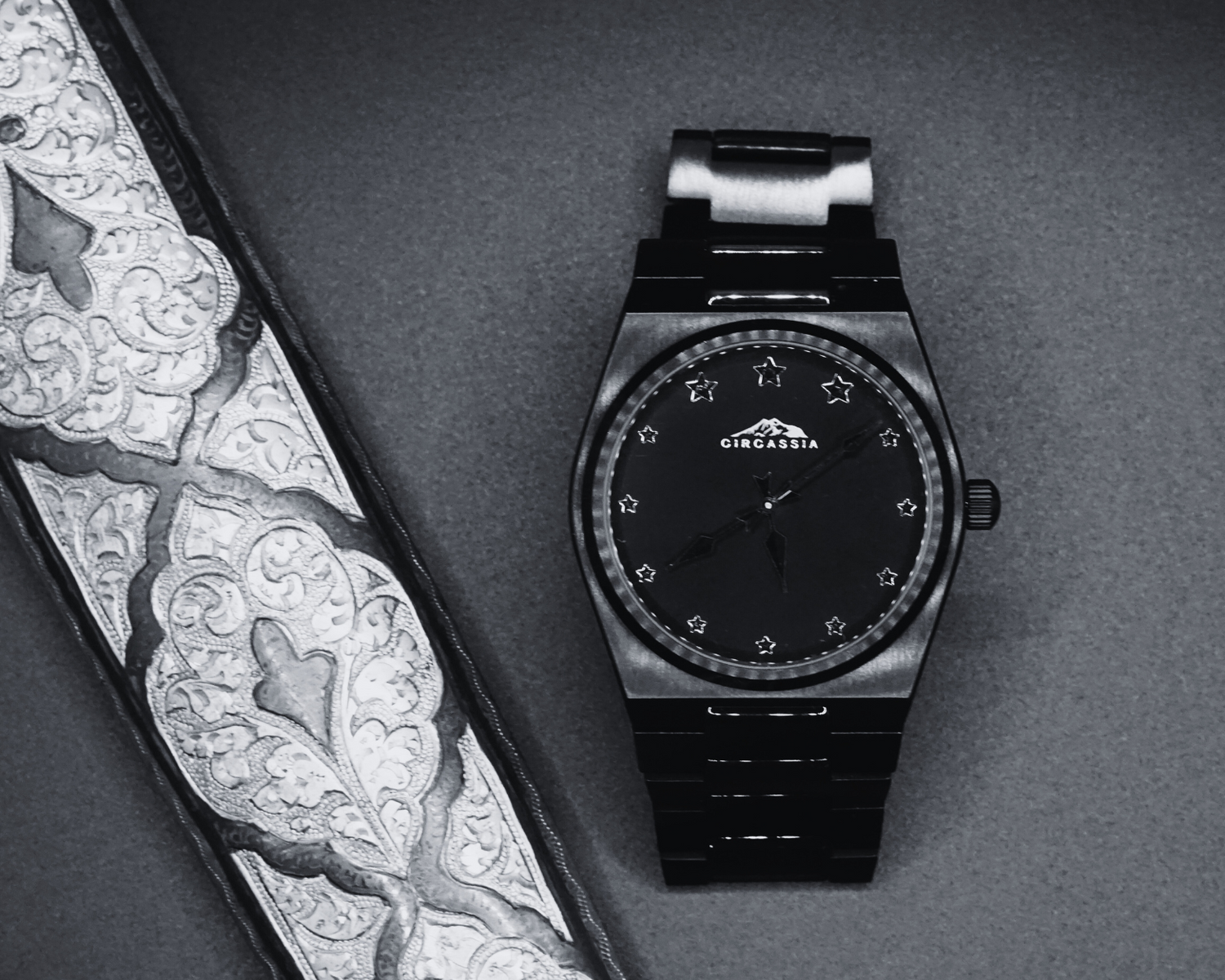 Image of 'Shadow of Sosruquo Noir,' a limited edition watch by Circassia, showcasing a rich black hue with gleaming gold accents. This exquisite piece combines Circassian heritage with modern luxury, embodying the perfect blend of Circassian jewelry and an ideal Circassian gift, symbolizing timeless elegance and stories.